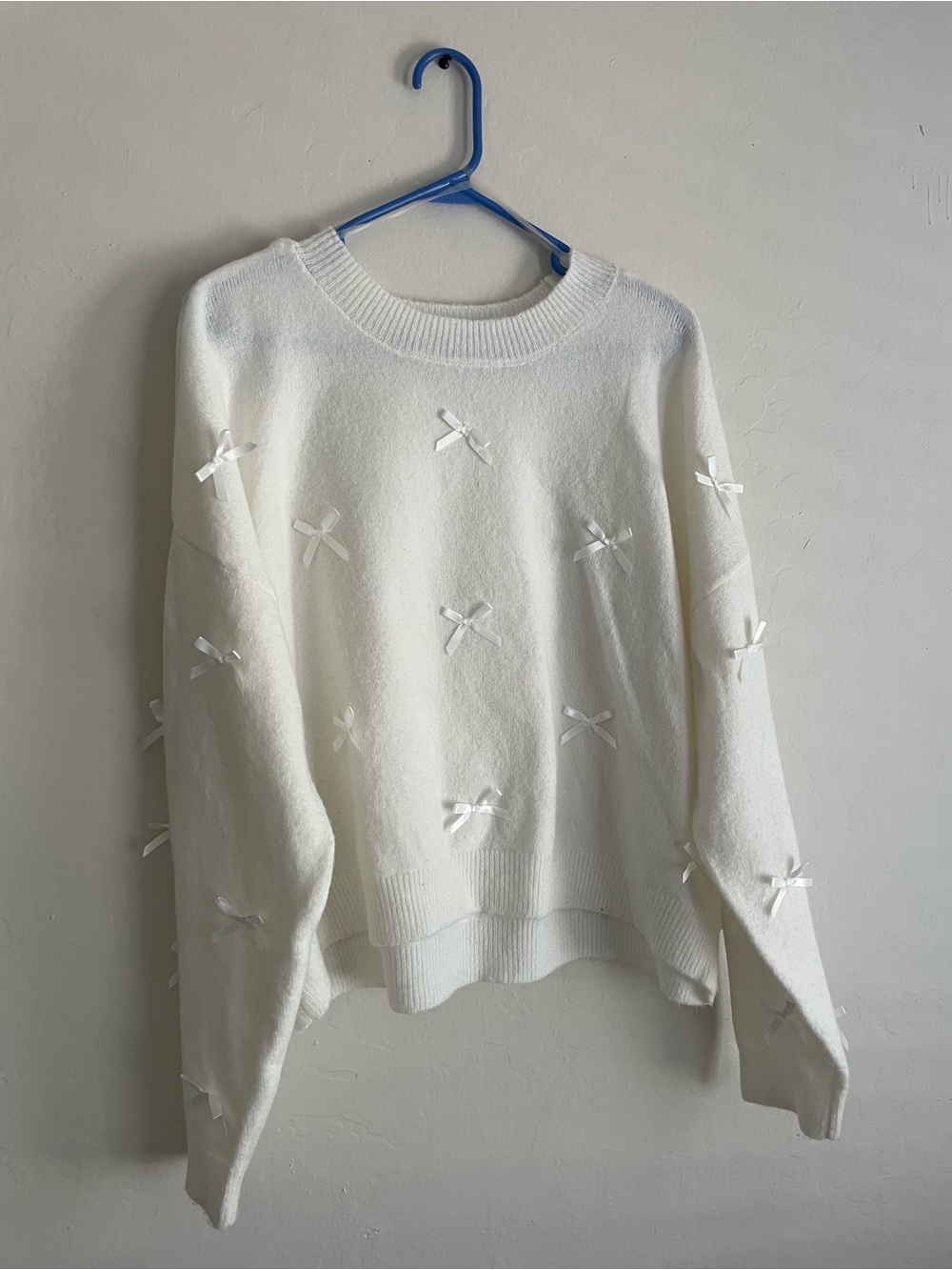 Crewneck sweater with bow details